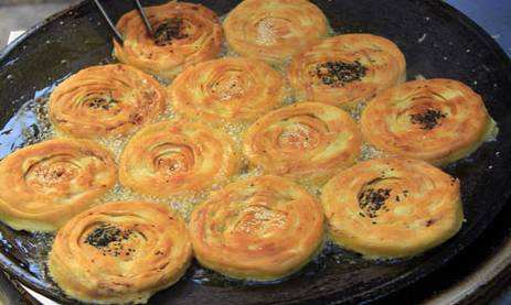 【成都鍋盔培訓】大學生擺攤賣鍋盔最高日入800元 【成都鍋盔培訓】大學生擺攤賣鍋盔最高日入800元